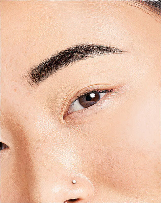 woman with natural black eyebrow tint