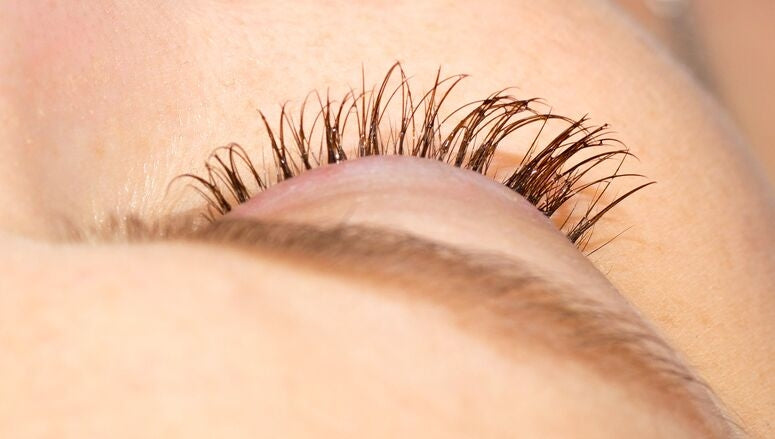 female lashes with growth serum