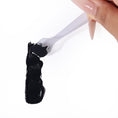 Load image into Gallery viewer, plastic makeup applicator swiping black tint