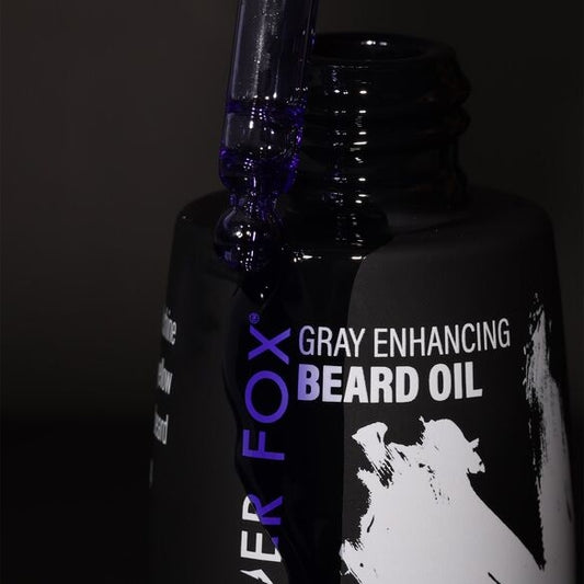 Closeup silver fox purple beard oil