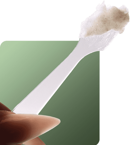 Eyebrow bleach cream product on spatula