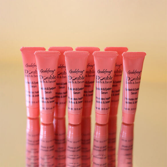 multiple tubes of double lash and brow serum
