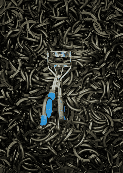 eyelash curler in a pile of rubber covers