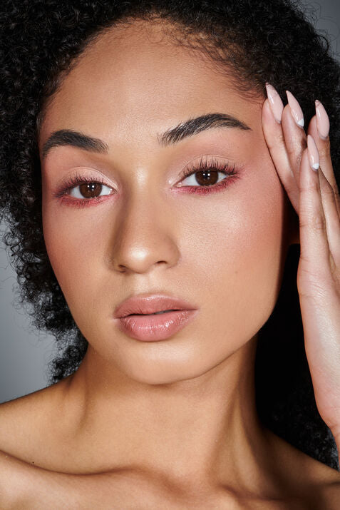 woman with red toned eyeshadow