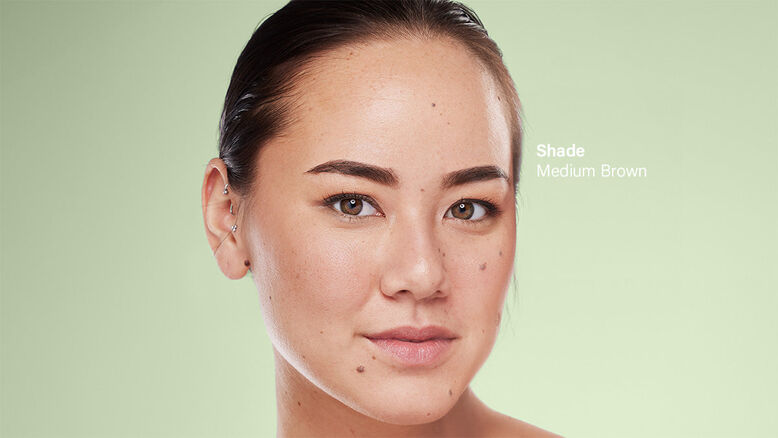 Woman with freshly tinted brown eyebrows