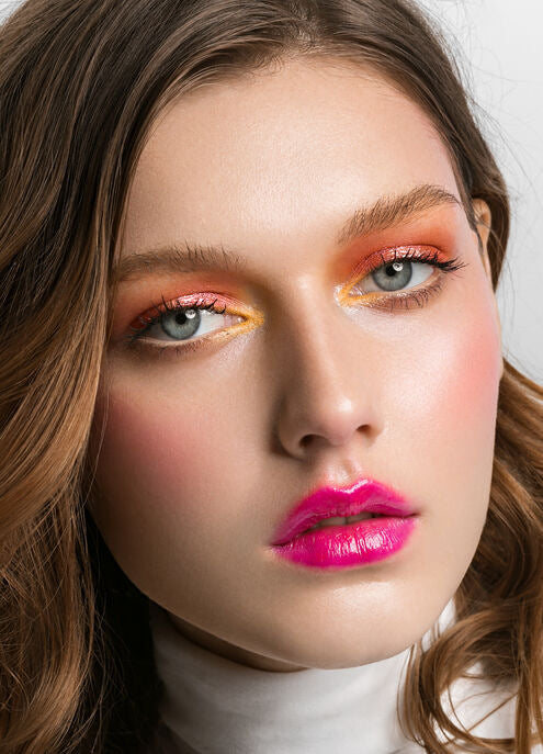 woman with colorful makeup