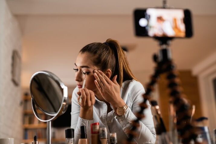 woman filming make-up video