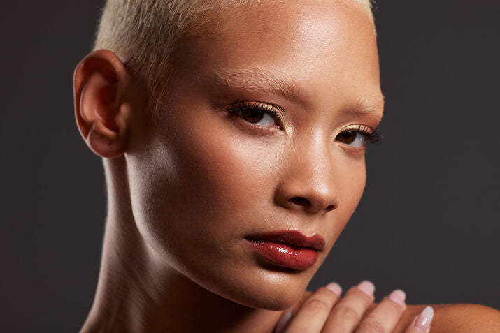 woman buzz cut and bleached brows