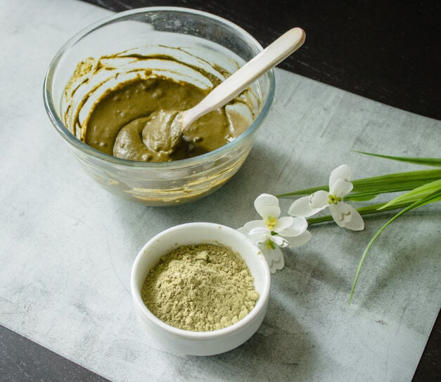 glass bowl with henna and dry henna
