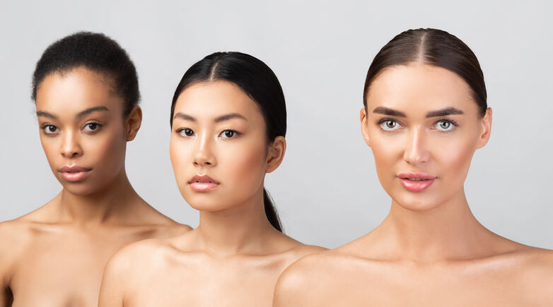 three women with their hair slicked back