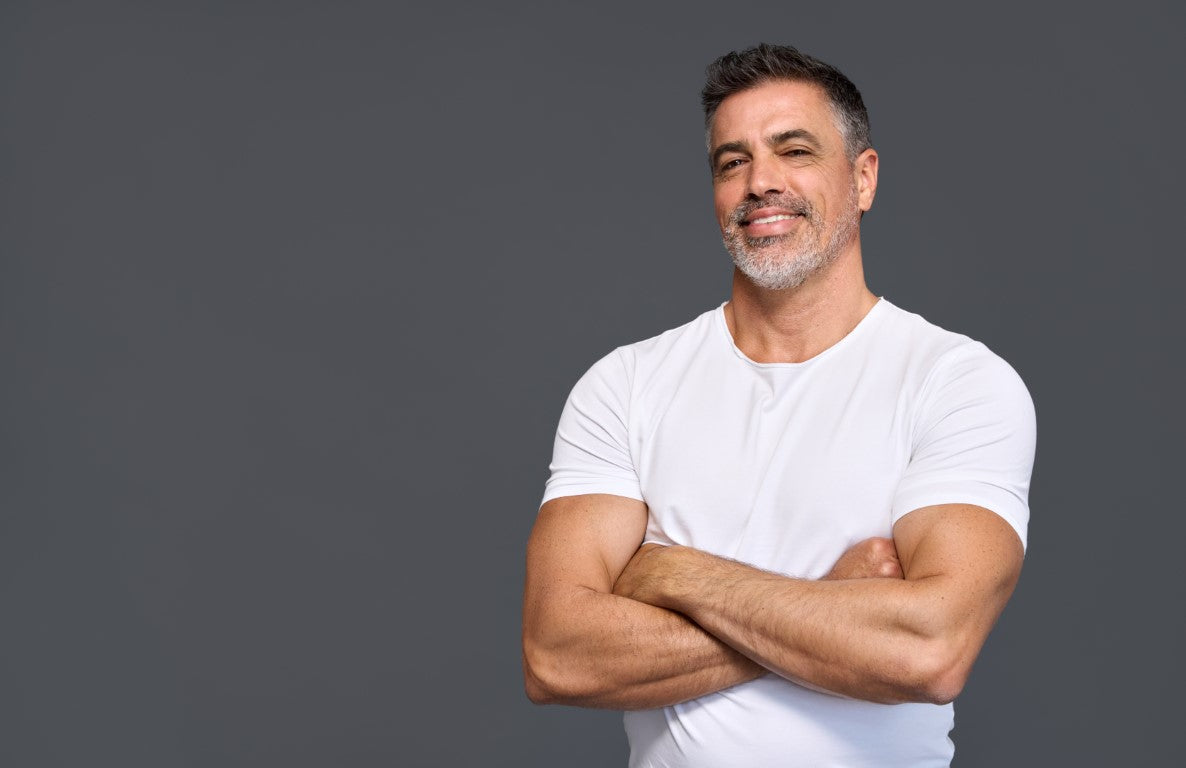 50 year old man white tshirt plain background