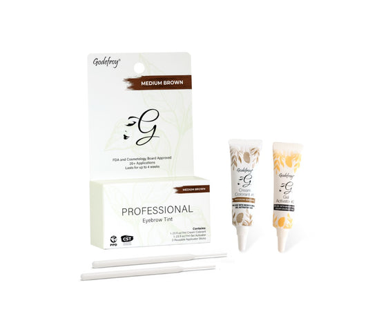 Complete professional eyebrow tint products in medium brown.