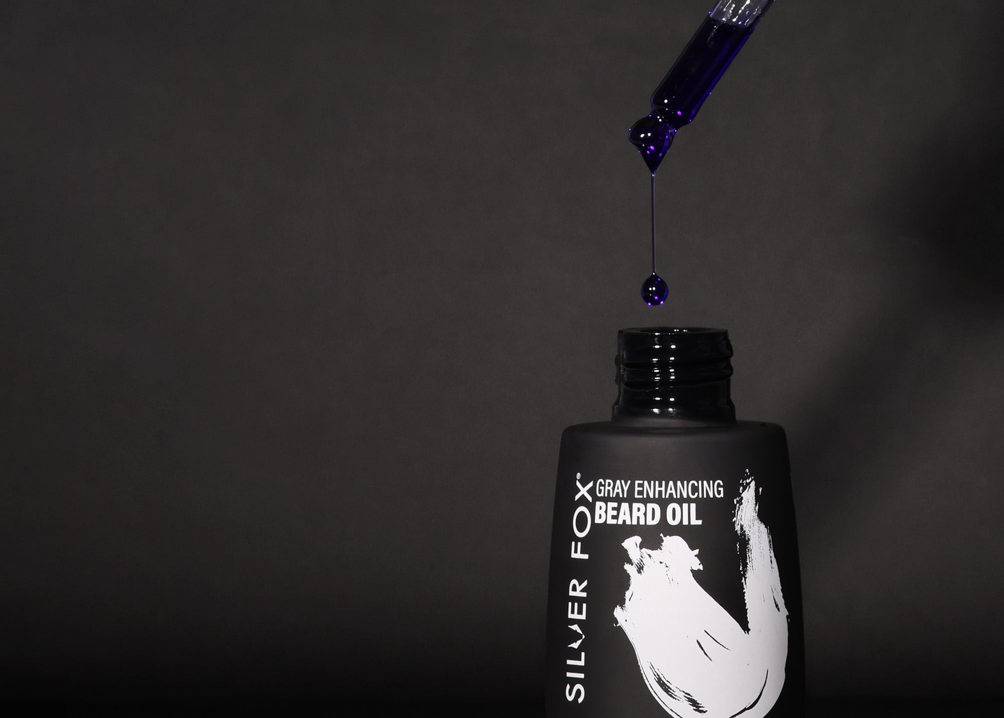 closeup silver fox gray enhancing purple beard oil 