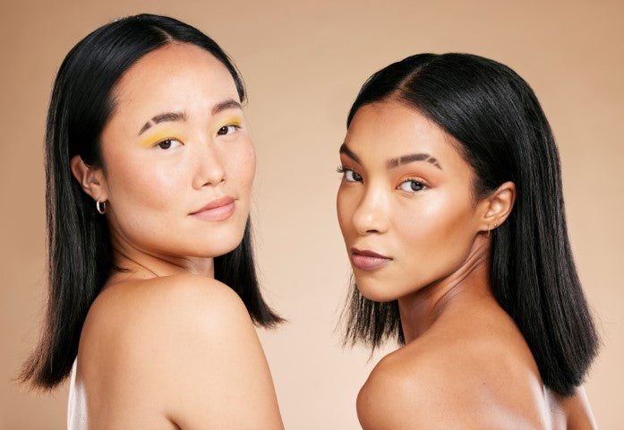 2 editorial women with eyebrow slits 