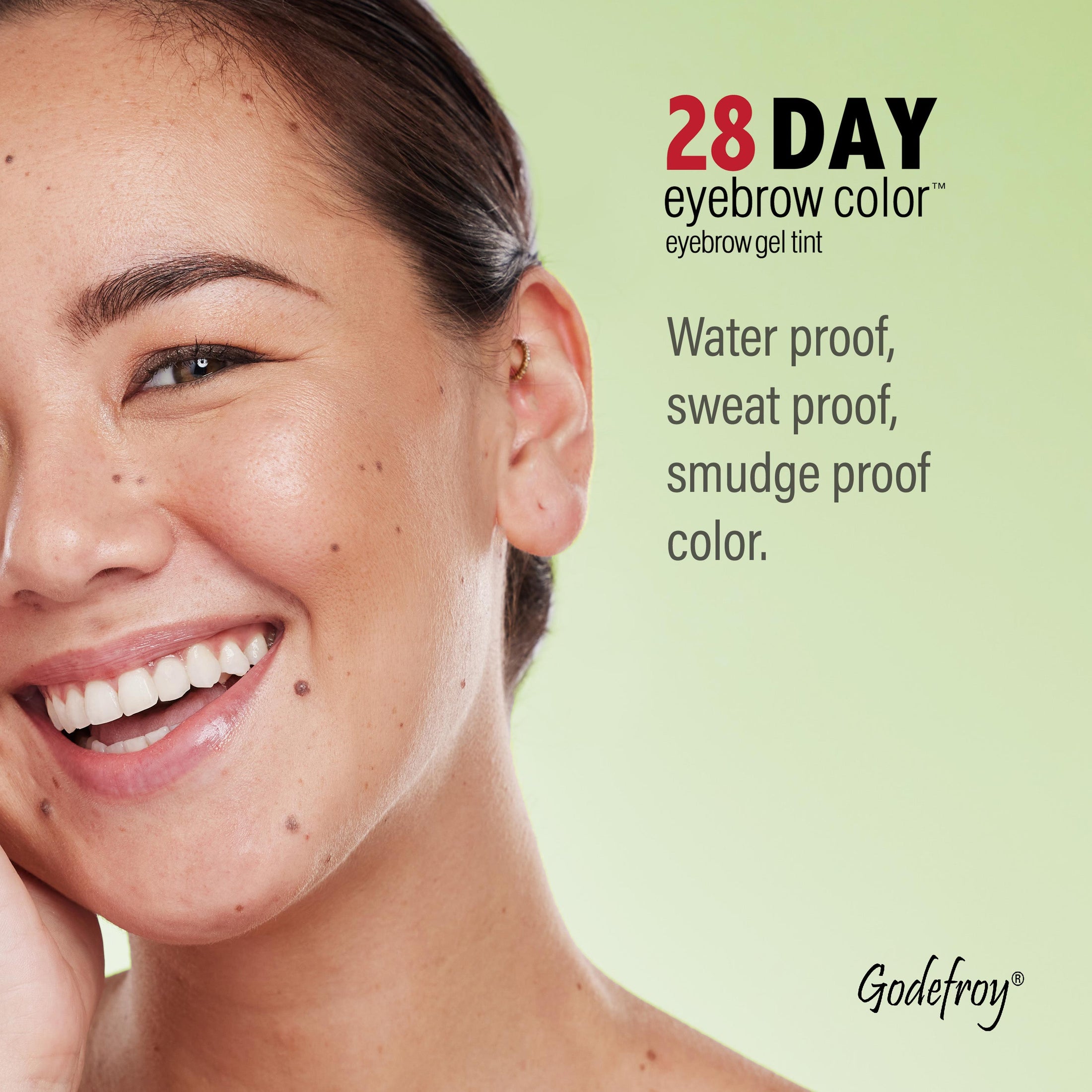 Woman smiling showing her tinted brows and 28 day components 