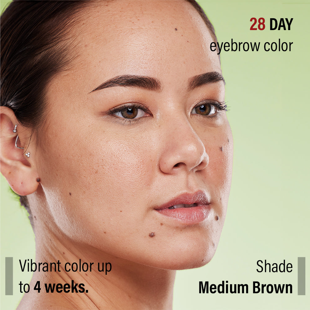 Woman showing her medium brown days with 28 day