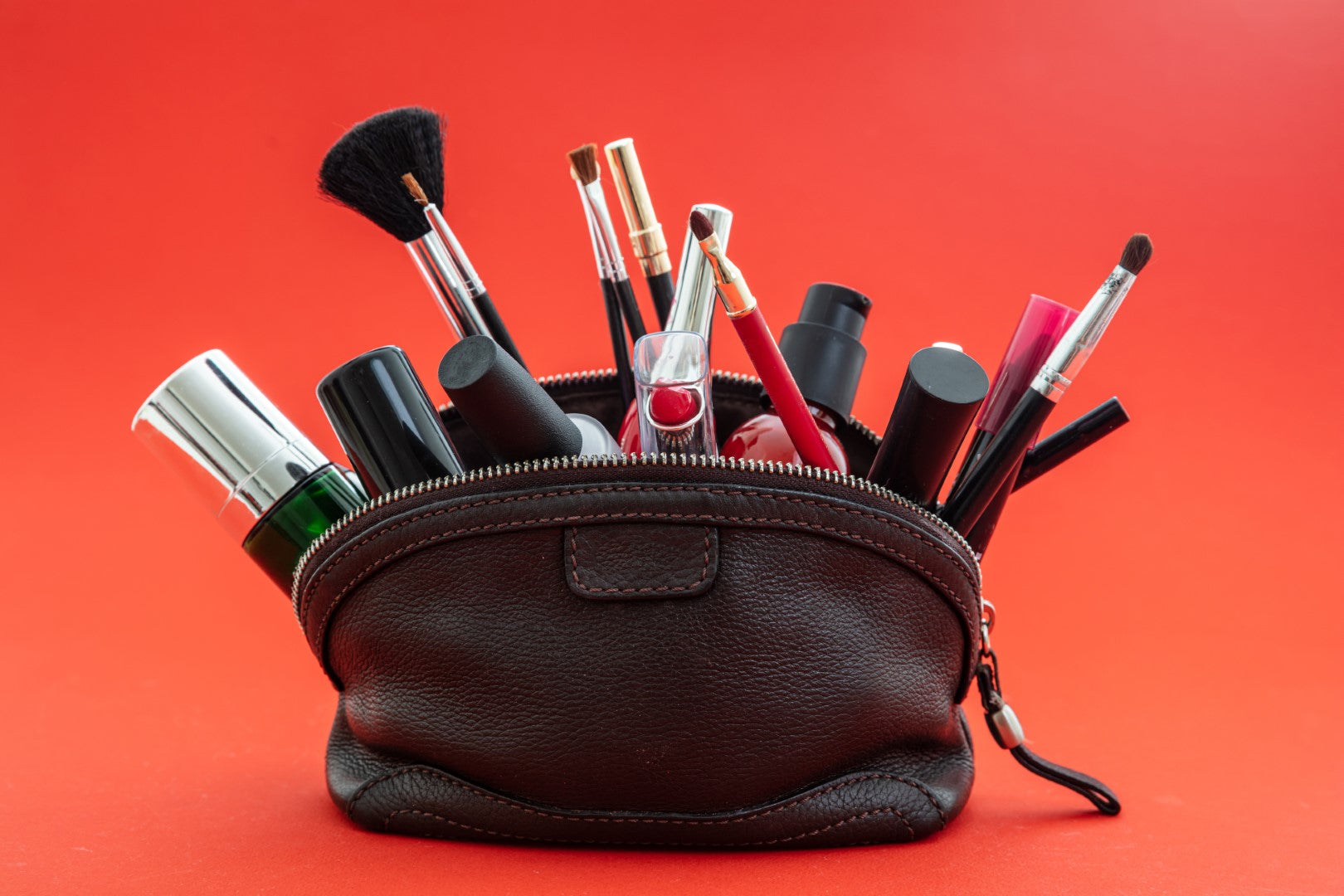 black makeup bag with brushes 