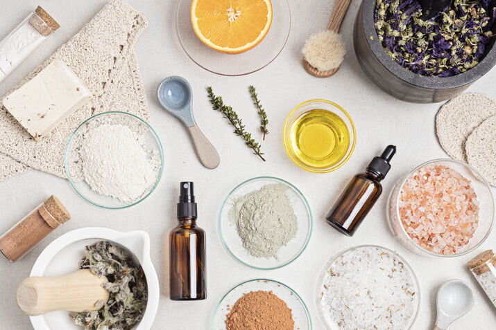 natural skincare ingredients and bottles