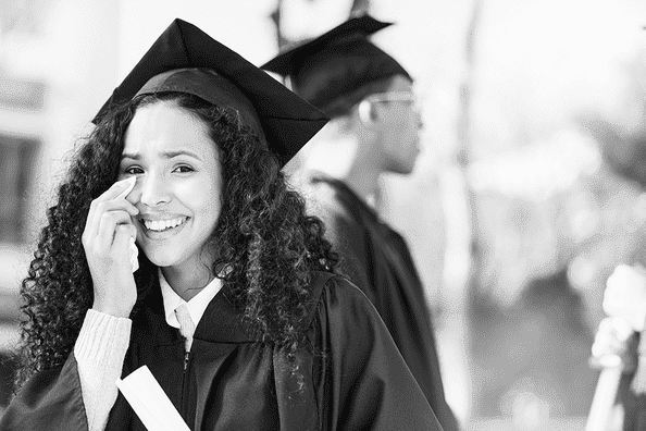 portrait of a young woman crying while celebrating
