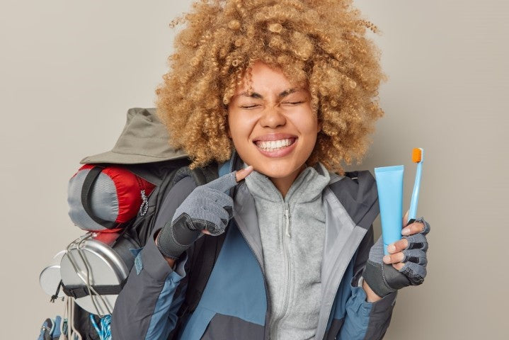 Traveling woman with dental care