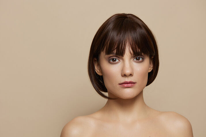 Woman with short hair and bangs